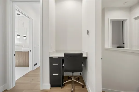 a view of a balcony with a swimming pool