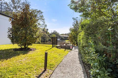 a view of swimming pool from a balcony
