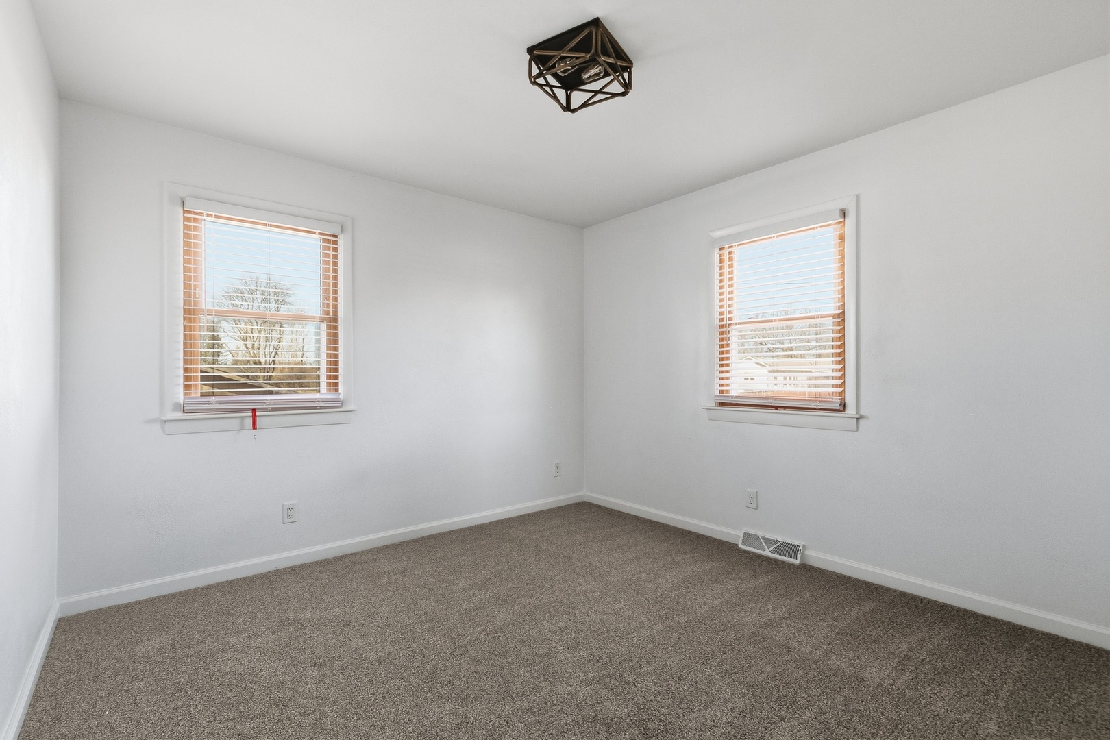 11622 27th Street West Milan, IL 61264 - Photo 25 of 49 an empty room with a window