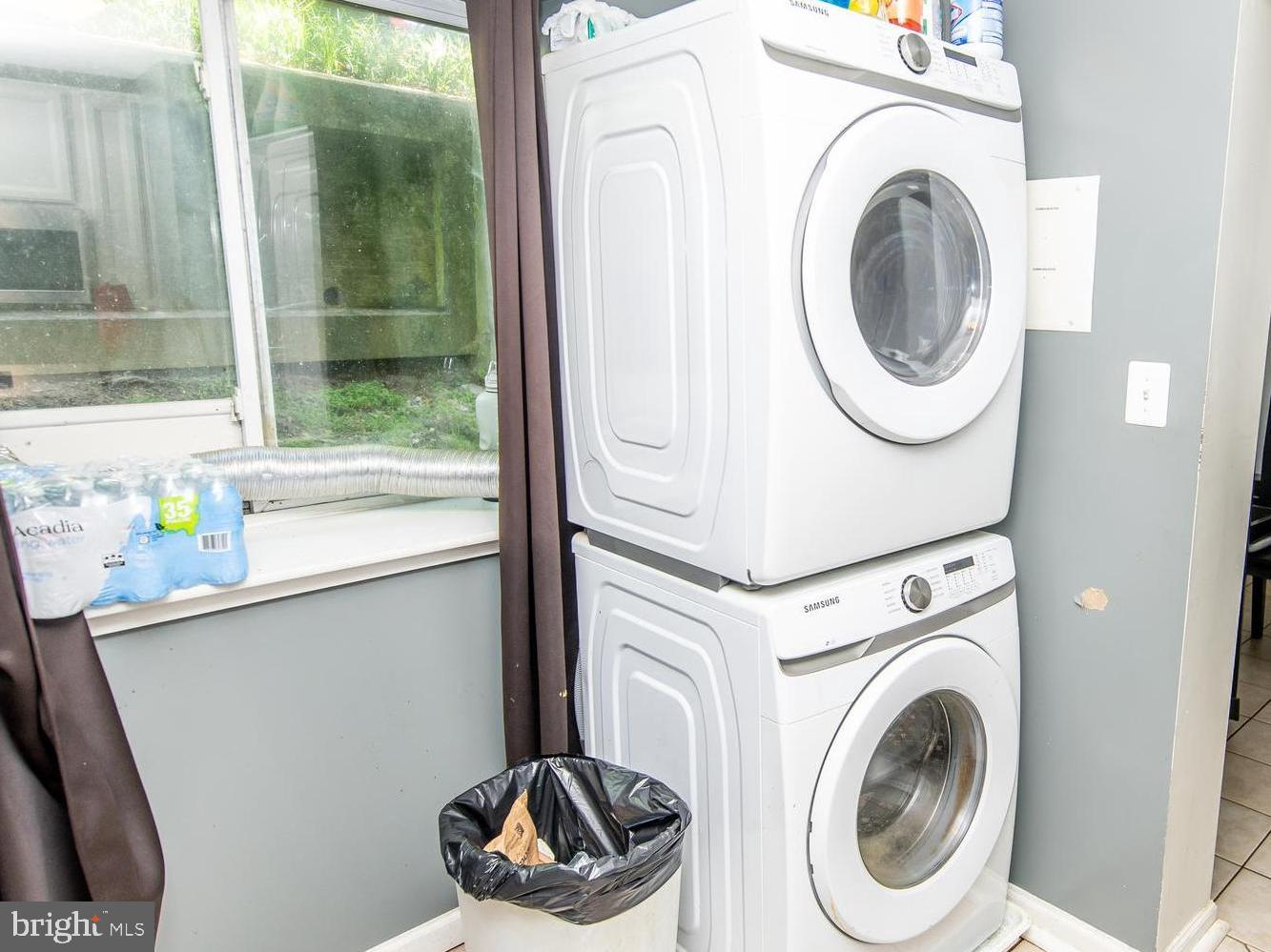 3934 Bel Pre Road, Unit 39342 Silver Spring, MD 20906 - Photo 22 of 30 a utility room with dryer and washer