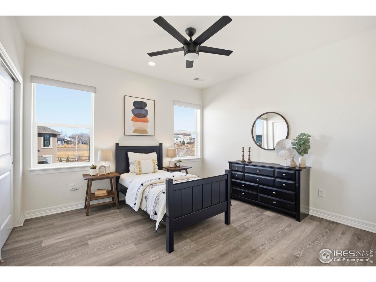 6402 Foothills View Place Fort Collins, CO 80528 - Photo 26 of 50 a bed room with a bed and a window