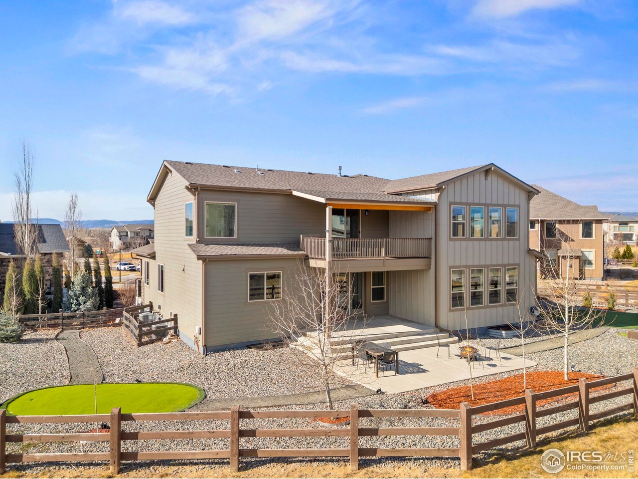 6402 Foothills View Place Fort Collins, CO 80528 - Photo 42 of 50 a aerial view of a house with swimming pool and porch