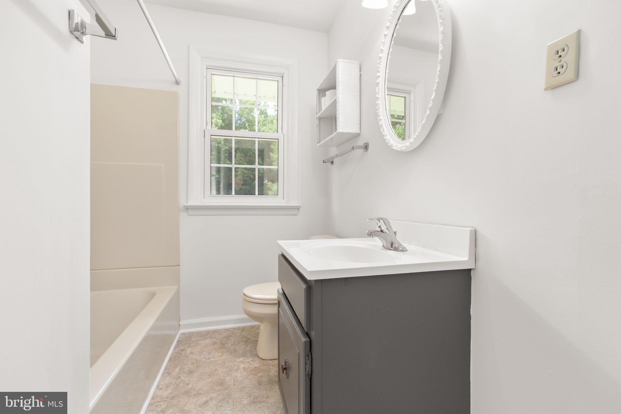 18136 Pepmeier Hill Road Fredericksburg, VA 22408 - Photo 29 of 80 a bathroom with a sink and a mirror