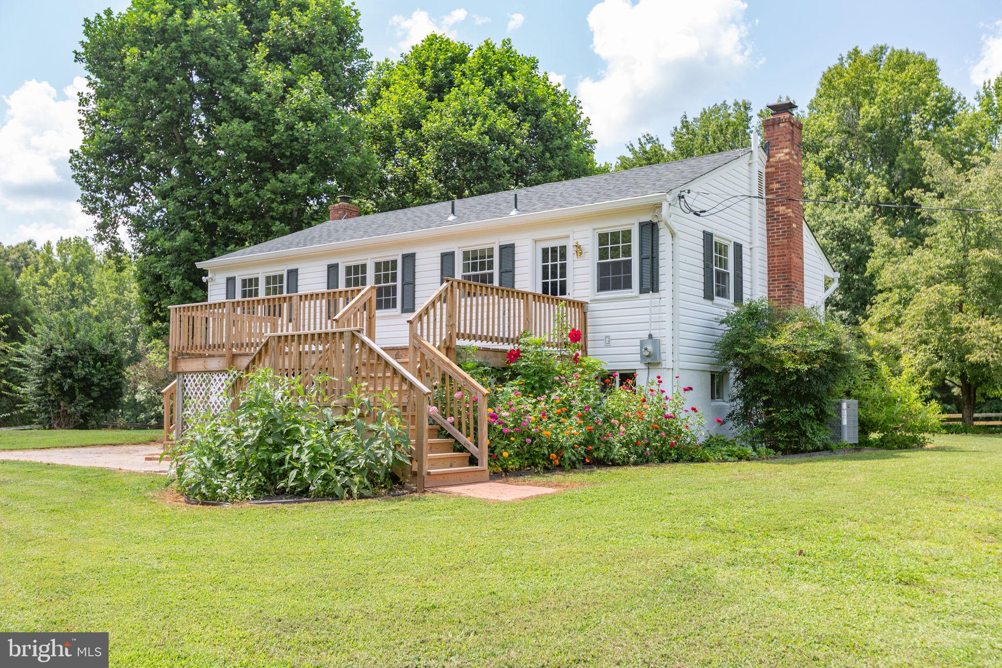 18136 Pepmeier Hill Road Fredericksburg, VA 22408 - Photo 41 of 80 a front view of house with yard and green space