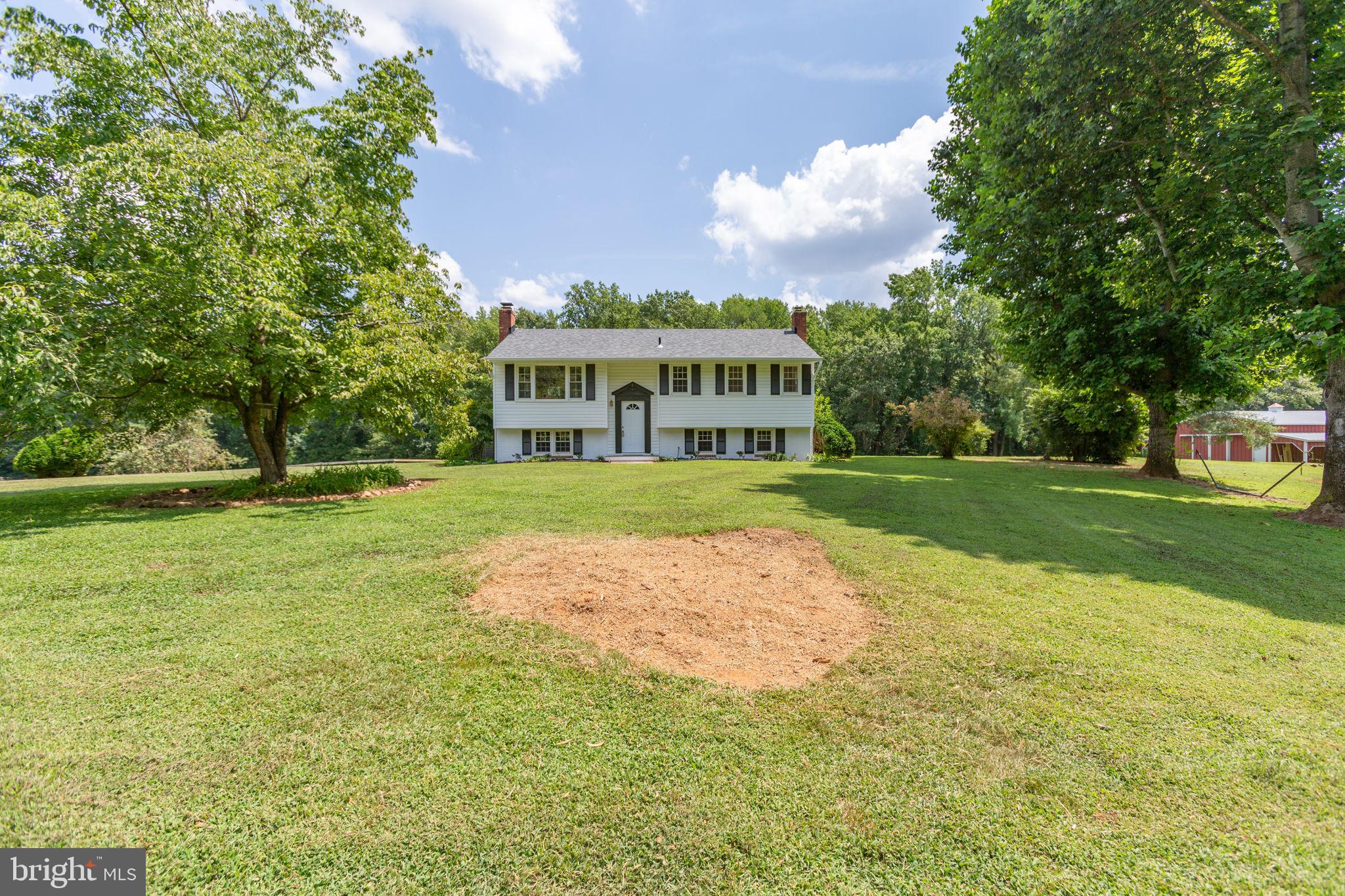 18136 Pepmeier Hill Road Fredericksburg, VA 22408 - Photo 52 of 80 a view of a house with a big yard
