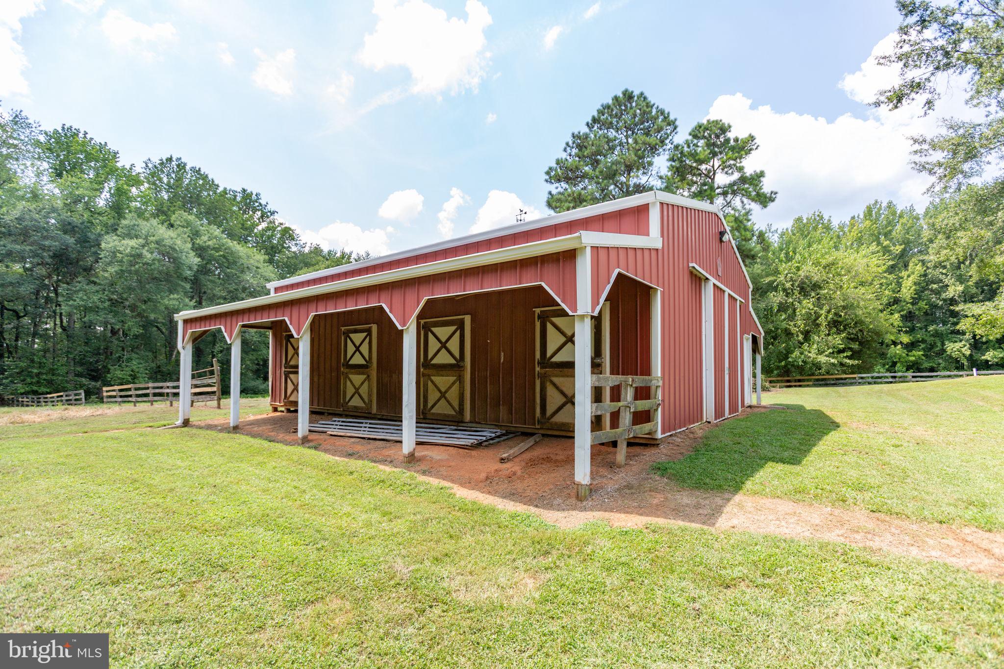 18136 Pepmeier Hill Road Fredericksburg, VA 22408 - Photo 56 of 80 a front view of house with yard and entertaining space