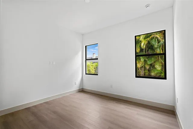 an empty room with windows