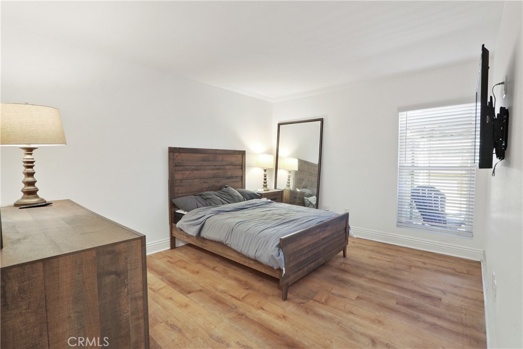 1440 West Lambert Road, Unit 233 La Habra, CA 90631 - Photo 13 of 26 a living room with a bed furniture and a window