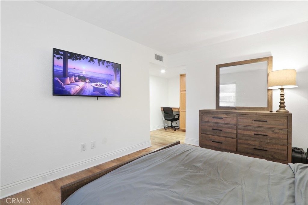 1440 West Lambert Road, Unit 233 La Habra, CA 90631 - Photo 14 of 26 a bed room with a bed and a television