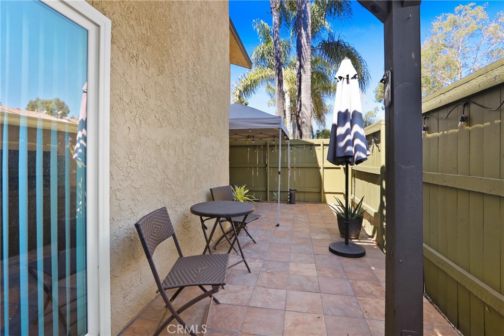 1440 West Lambert Road, Unit 233 La Habra, CA 90631 - Photo 22 of 26 a view of a porch with chairs and front door