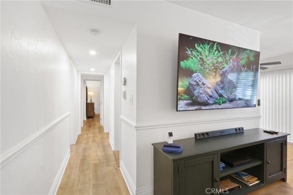 1440 West Lambert Road, Unit 233 La Habra, CA 90631 - Photo 4 of 26 a view of a hallway with workspace