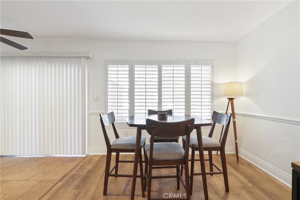 1440 West Lambert Road, Unit 233 La Habra, CA 90631 - Photo 7 of 26 a view of a dining room with furniture and a window