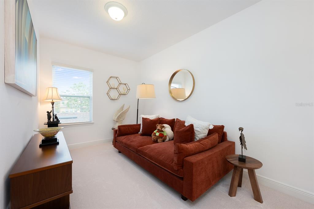 12305 Via Derna Place Windermere, FL 34786 - Photo 16 of 24 a living room with furniture