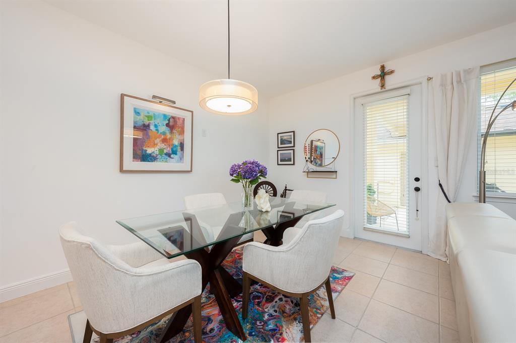 12305 Via Derna Place Windermere, FL 34786 - Photo 8 of 24 a dining room with furniture and window