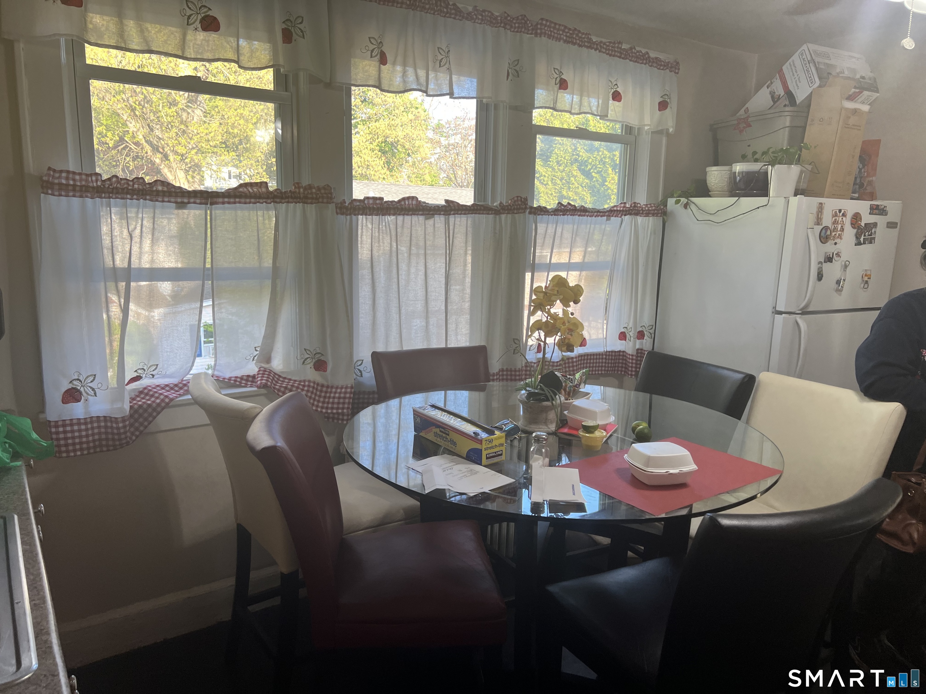 275 Long Ridge Road Stamford, CT 06905 - Photo 12 of 40 a dining room with furniture and a window
