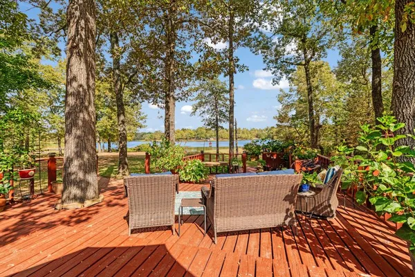a view of a chairs and table on the wooden floor