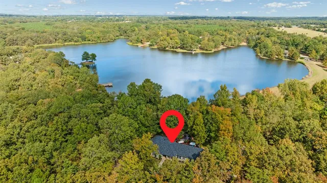 a view of a lake with a house