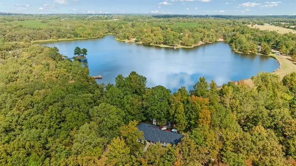 a picture of a bathroom with a sink and cabinets