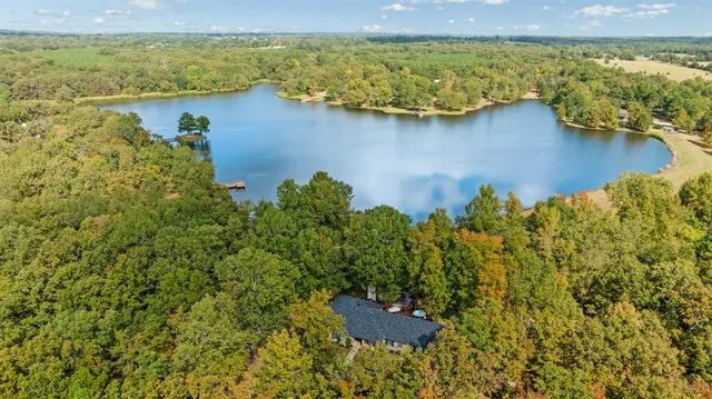 a picture of a bathroom with a sink and cabinets