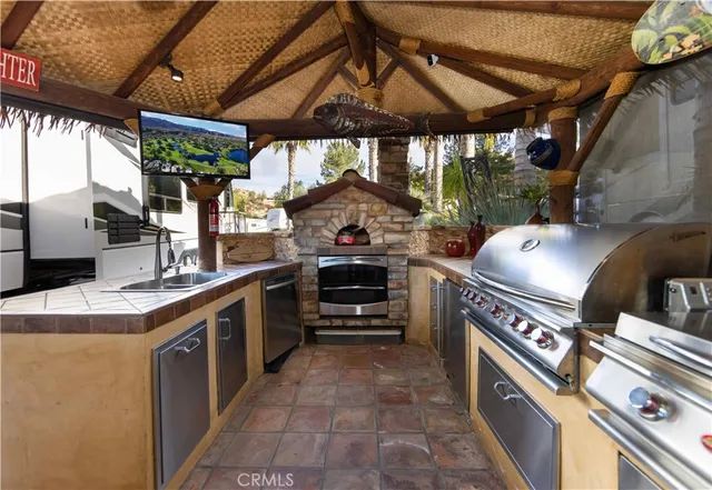 a kitchen with a stove and a microwave