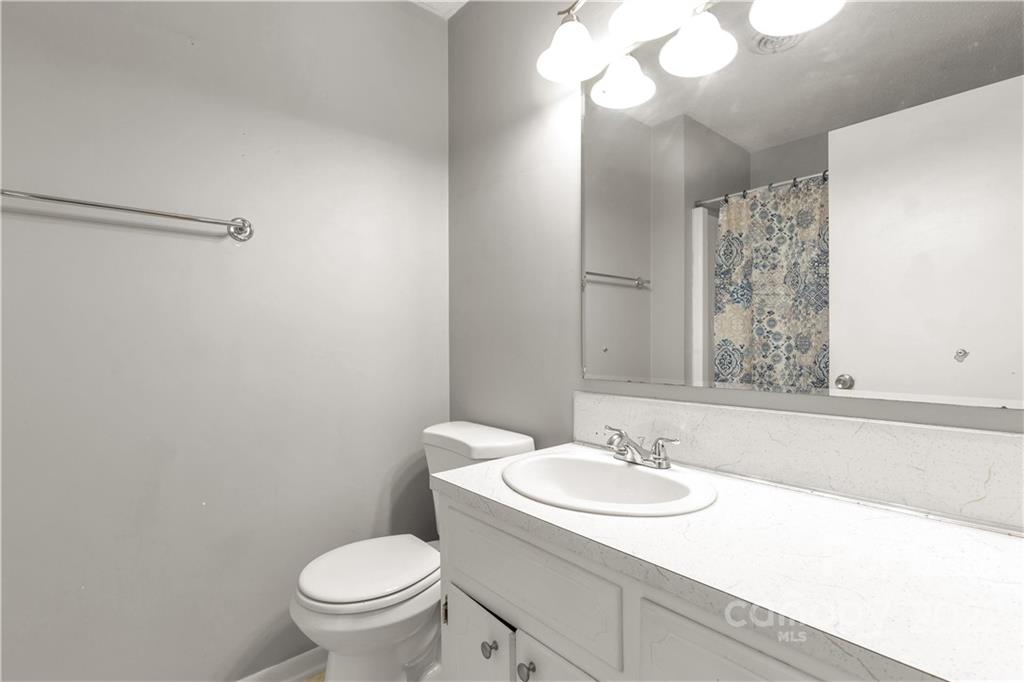 1909 John Everall Road Lancaster, SC 29720 - Photo 14 of 32 a bathroom with a sink toilet and a mirror