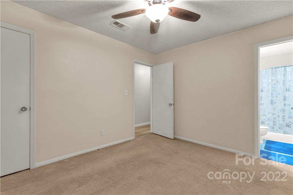 1909 John Everall Road Lancaster, SC 29720 - Photo 18 of 32 a view of an empty room and chandelier fan