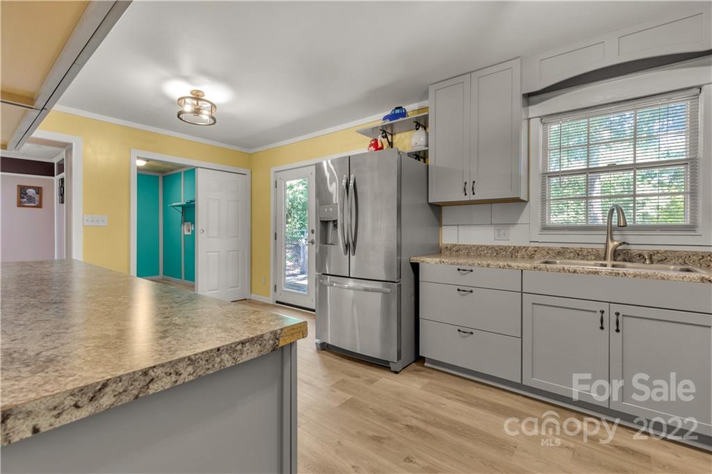 1909 John Everall Road Lancaster, SC 29720 - Photo 9 of 32 a kitchen with a sink appliances and cabinets