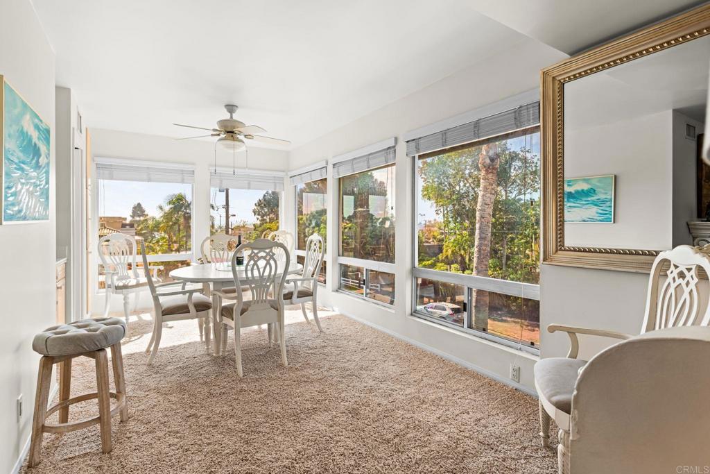 1105 Reed Avenue San Diego, CA 92109 - Photo 13 of 34 a view of a dining room with furniture window and outside view