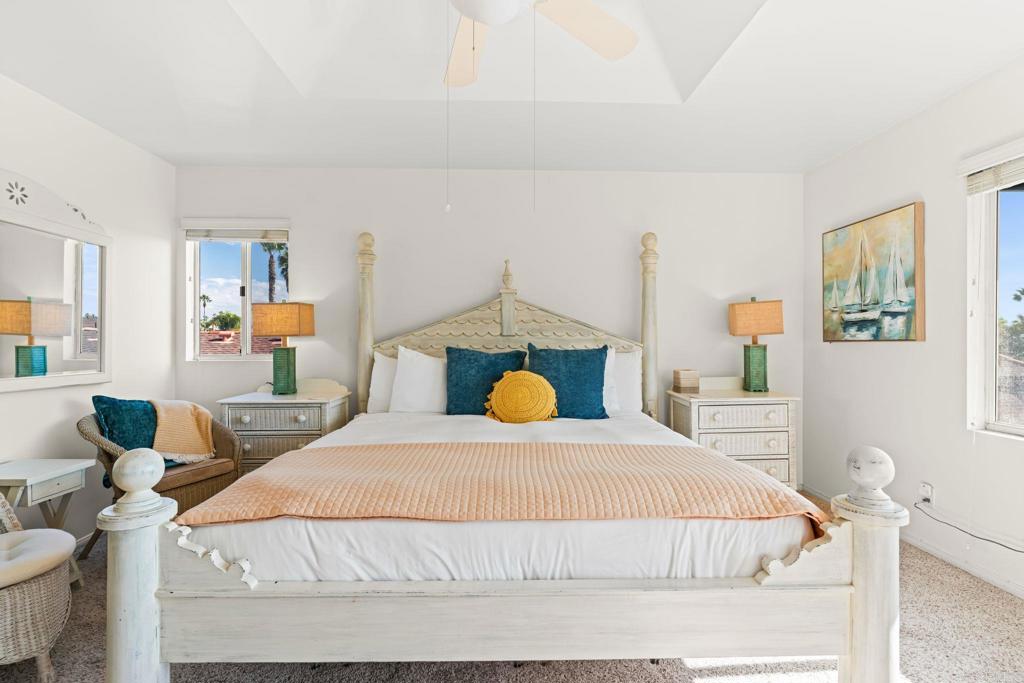 1105 Reed Avenue San Diego, CA 92109 - Photo 17 of 34 a bedroom with a bed and window