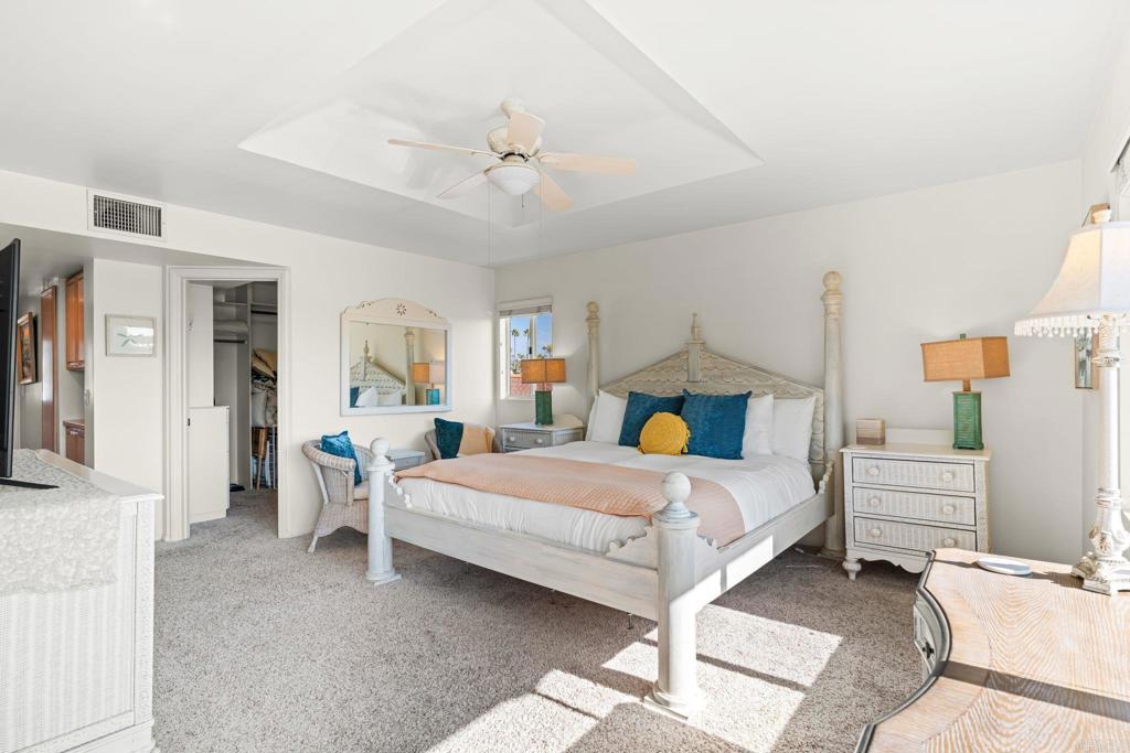 1105 Reed Avenue San Diego, CA 92109 - Photo 19 of 34 a bedroom with a bed and window