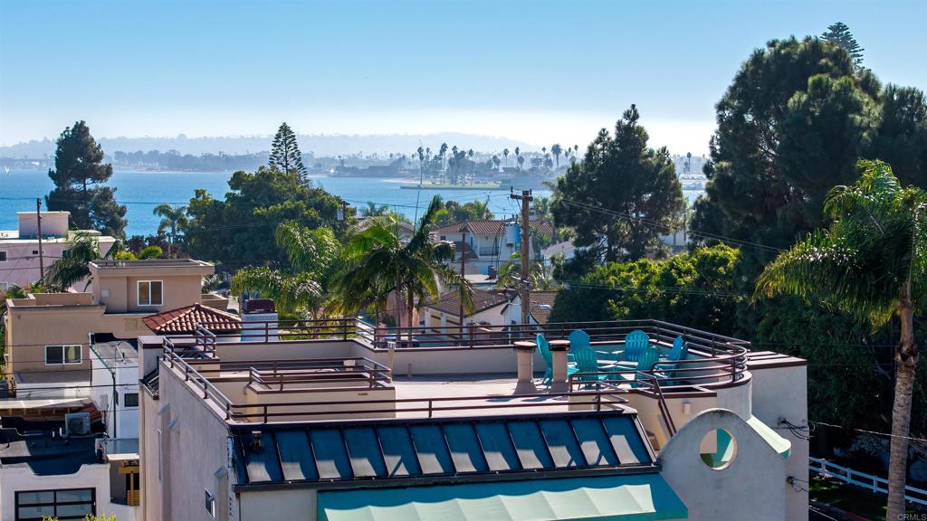 1105 Reed Avenue San Diego, CA 92109 - Photo 25 of 34 a view of a chairs and table in patio