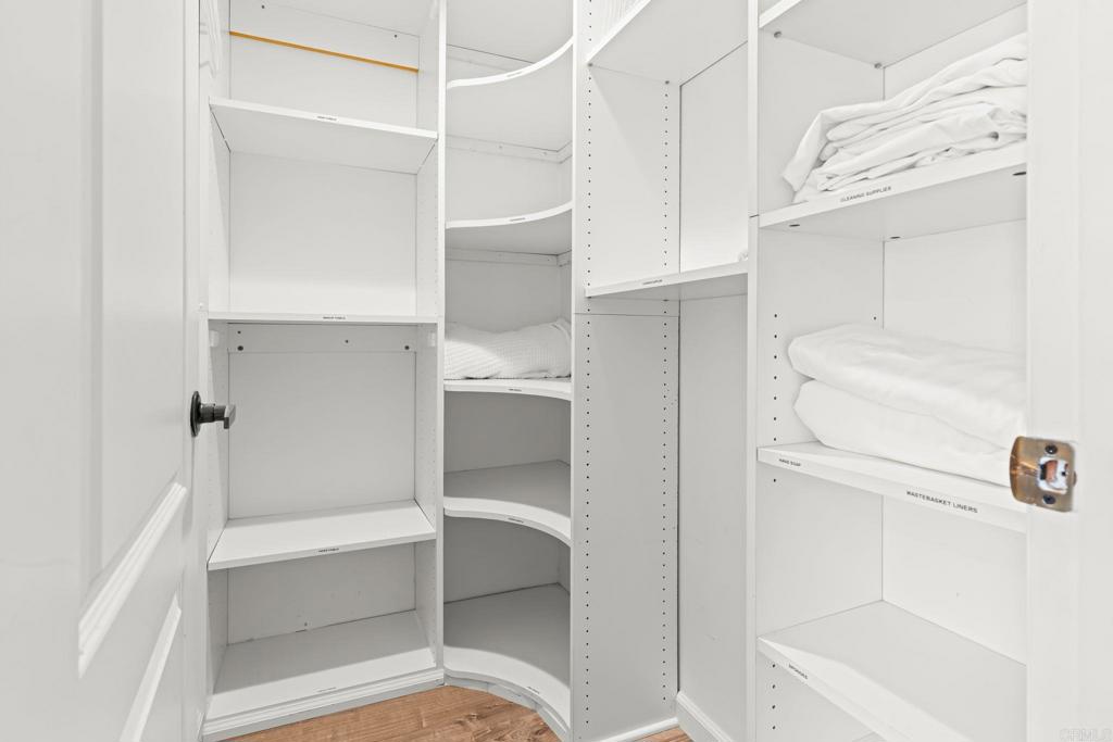 1105 Reed Avenue San Diego, CA 92109 - Photo 10 of 34 a view of walk in closet and cabinet