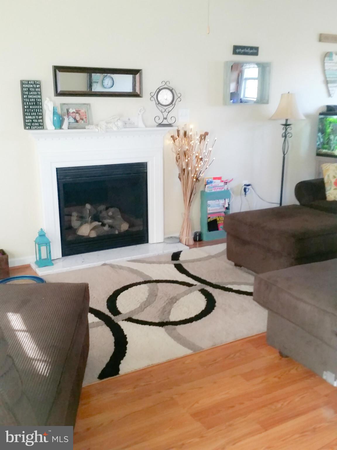 426 Thumper Drive Ranson, WV 25438 - Photo 2 of 30 a living room with furniture and a fireplace