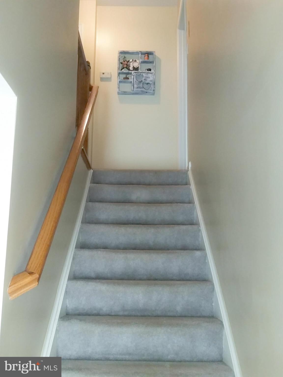 426 Thumper Drive Ranson, WV 25438 - Photo 12 of 30 a view of staircase with white walls