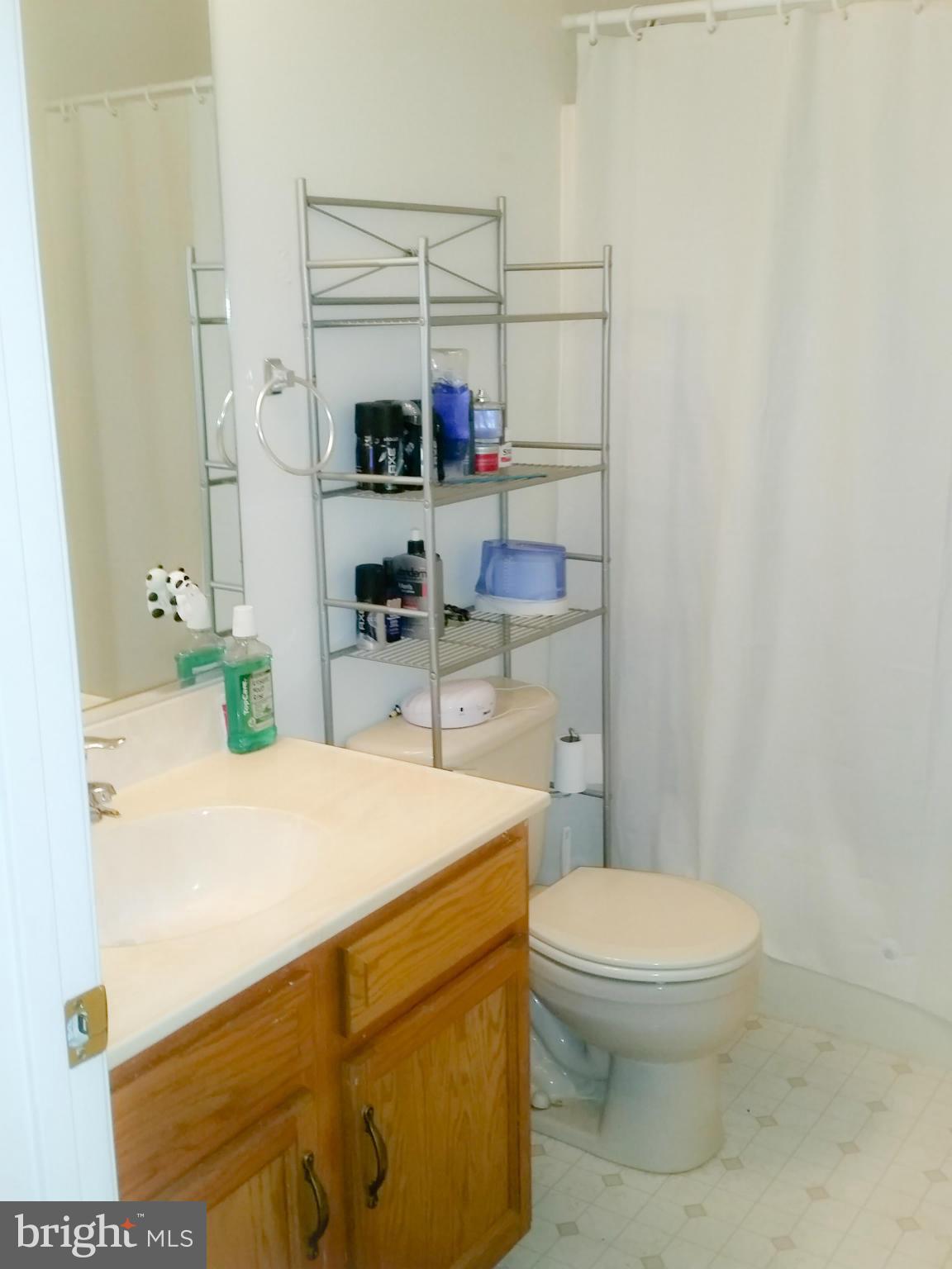 426 Thumper Drive Ranson, WV 25438 - Photo 21 of 30 a bathroom with a sink a toilet and a shower