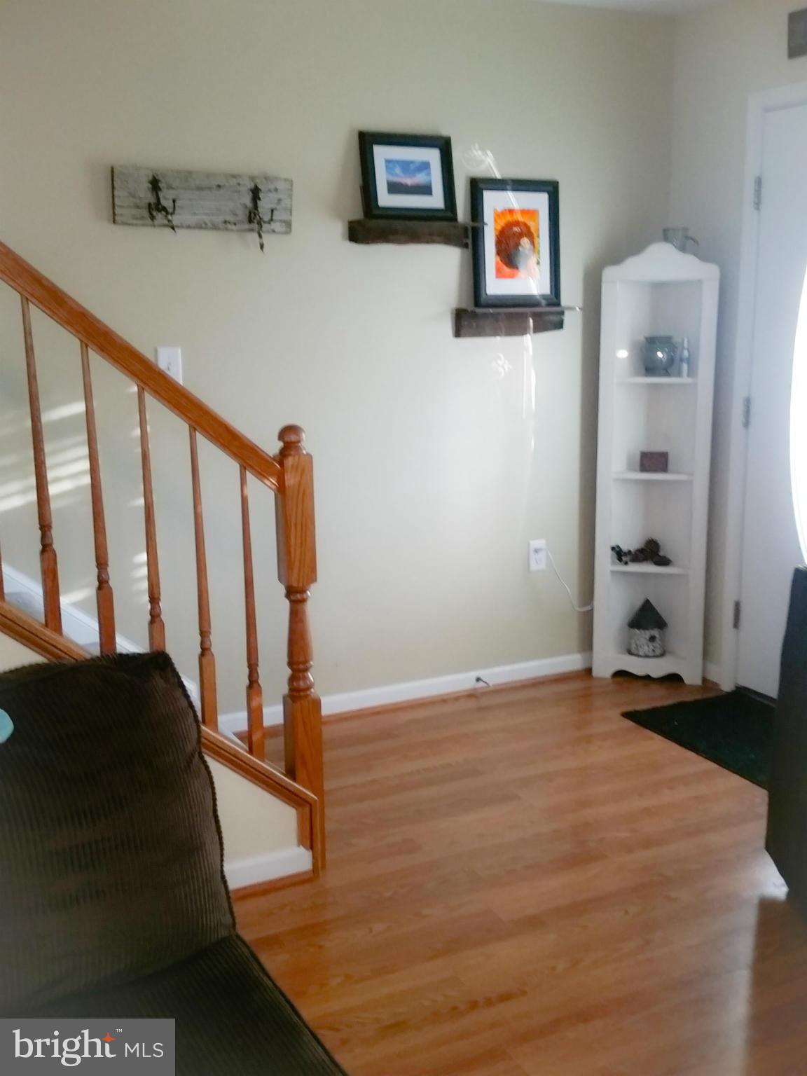 426 Thumper Drive Ranson, WV 25438 - Photo 6 of 30 a view of entryway and hall with wooden floor