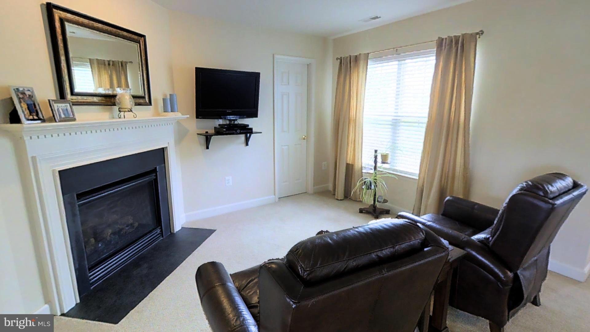 1711 Canal Clipper Court Point of Rocks, MD 21777 - Photo 18 of 30 a room with furniture and a flat screen tv