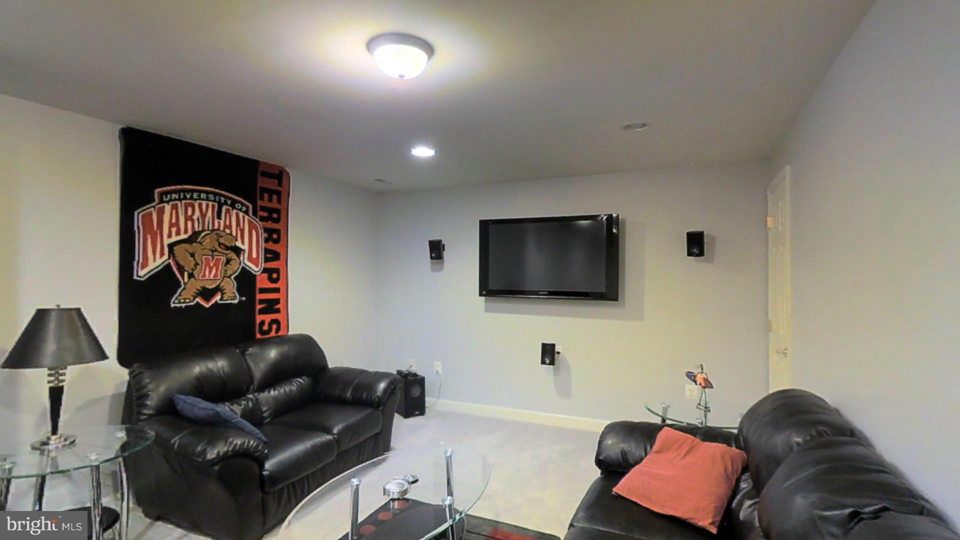 1711 Canal Clipper Court Point of Rocks, MD 21777 - Photo 23 of 30 a living room with furniture and a flat screen tv
