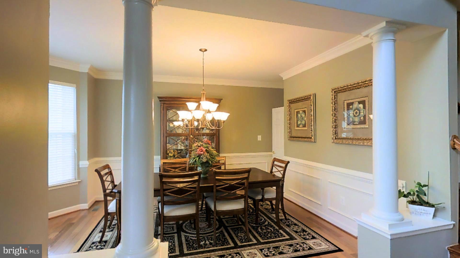 1711 Canal Clipper Court Point of Rocks, MD 21777 - Photo 5 of 30 a dining room with furniture a chandelier and wooden floor