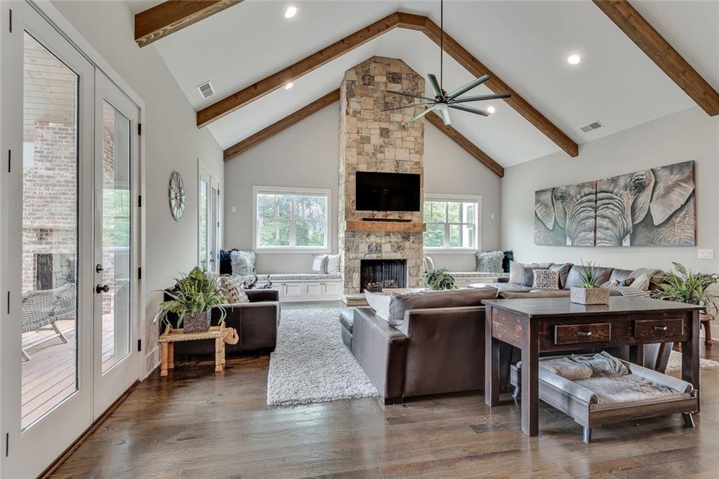 2503 Sugar Pike Road Canton, GA 30115 - Photo 83 of 134 a living room with fireplace furniture and a large window