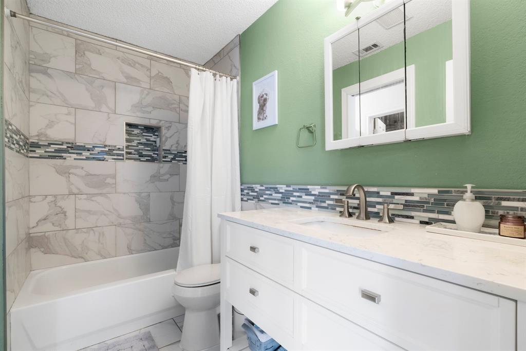 7635 Guadalupe Street, Unit 202 Austin, TX 78752 - Photo 15 of 22 Updated bath.