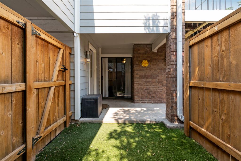 7635 Guadalupe Street, Unit 202 Austin, TX 78752 - Photo 18 of 22 Covered patio.