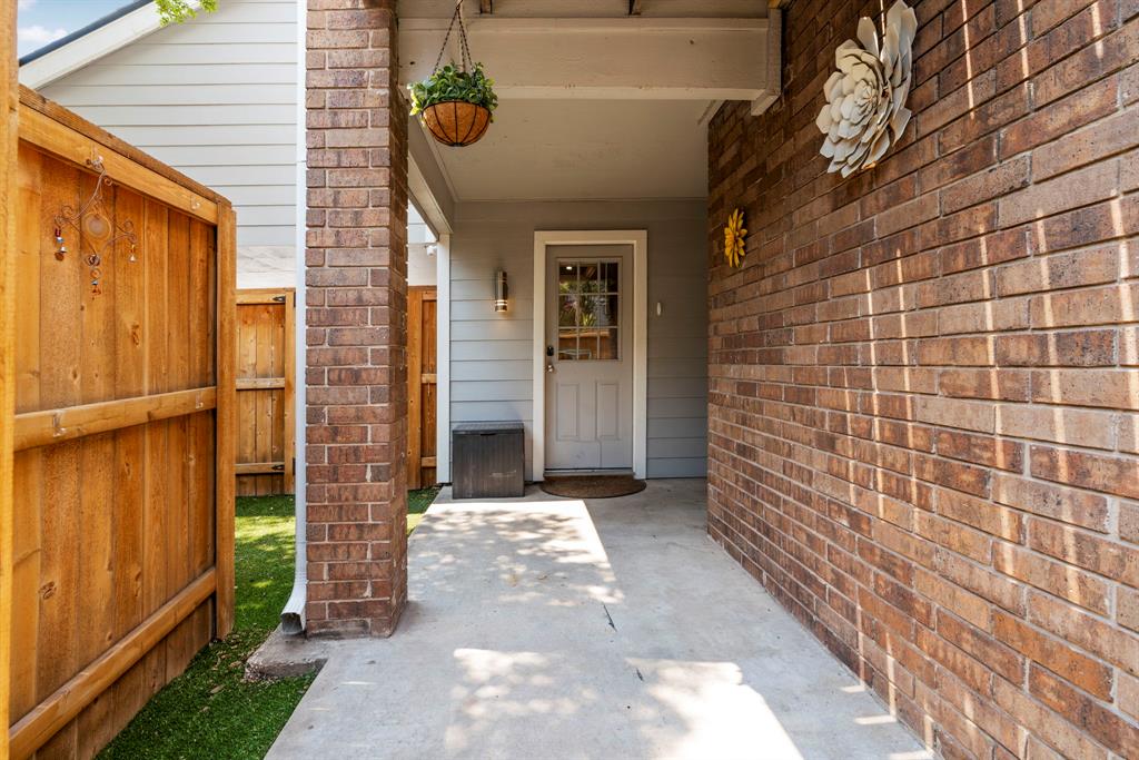 7635 Guadalupe Street, Unit 202 Austin, TX 78752 - Photo 9 of 22 Rear door to kitchen.