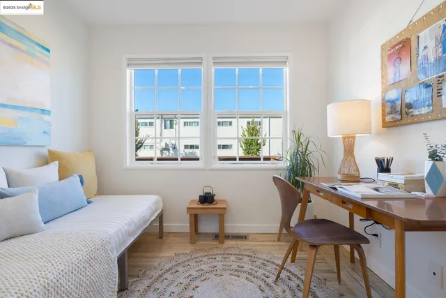 a workspace with furniture and window