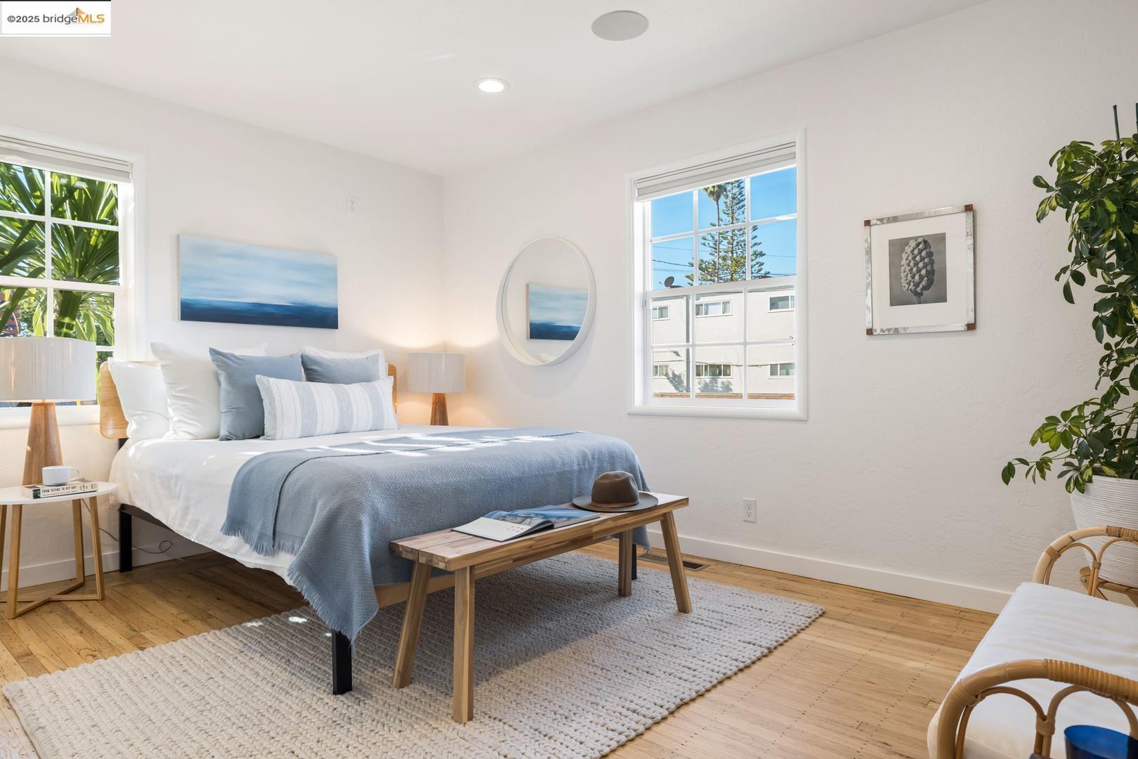 2829 California Street Berkeley, CA 94703 - Photo 17 of 20 a bedroom with a bed and wooden floor