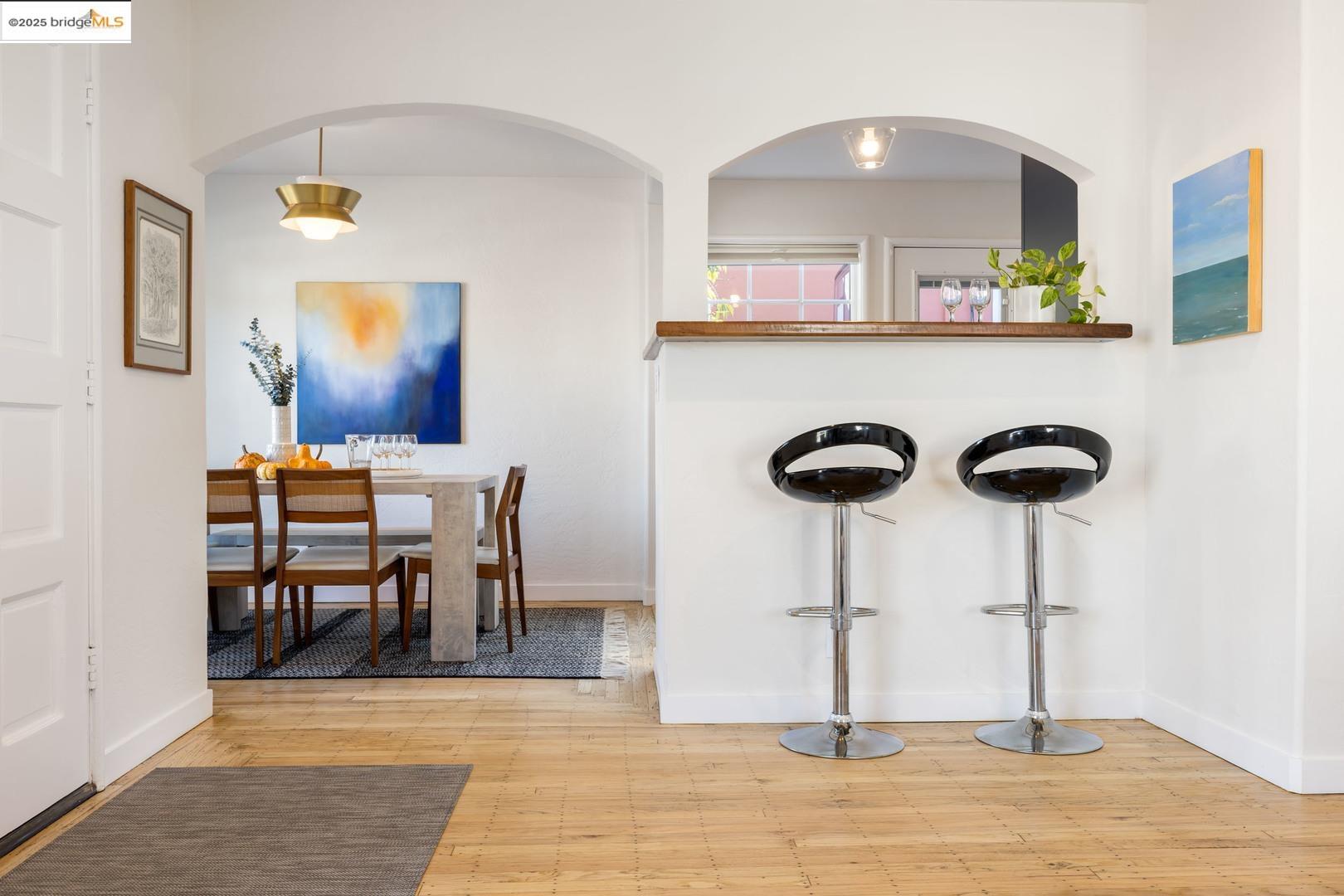 2829 California Street Berkeley, CA 94703 - Photo 6 of 20 a view of a dining room with furniture and chandelier