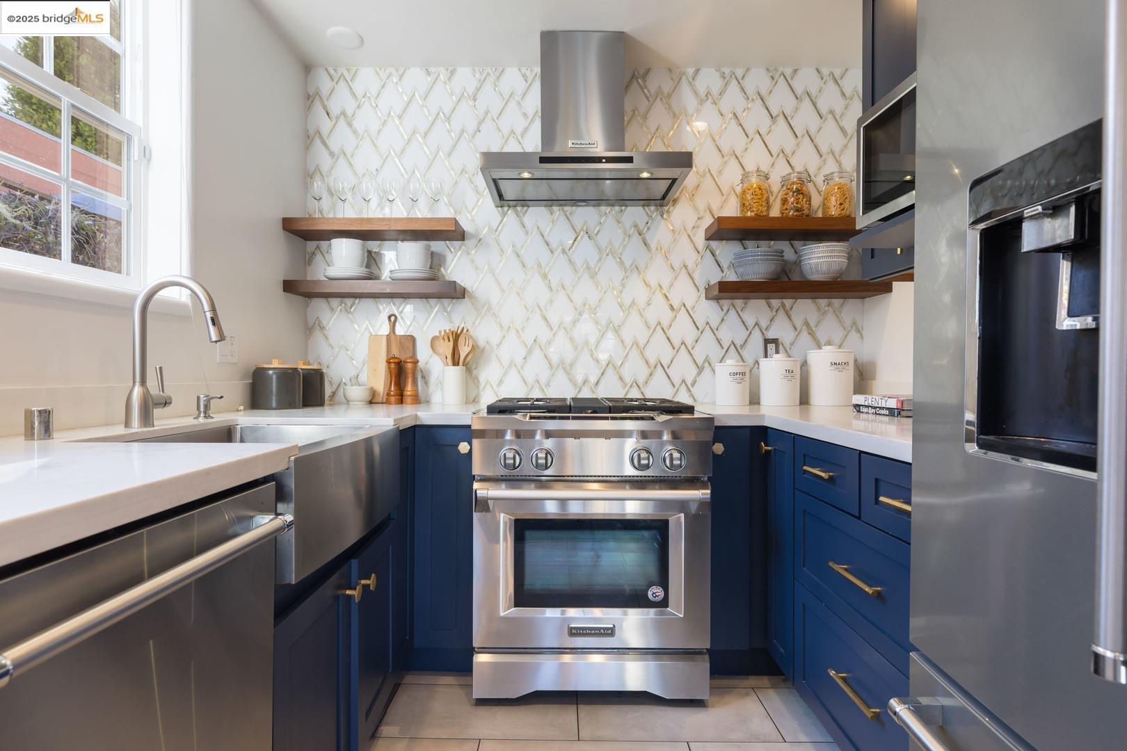 2829 California Street Berkeley, CA 94703 - Photo 10 of 20 a kitchen with stainless steel appliances granite countertop a stove and a sink