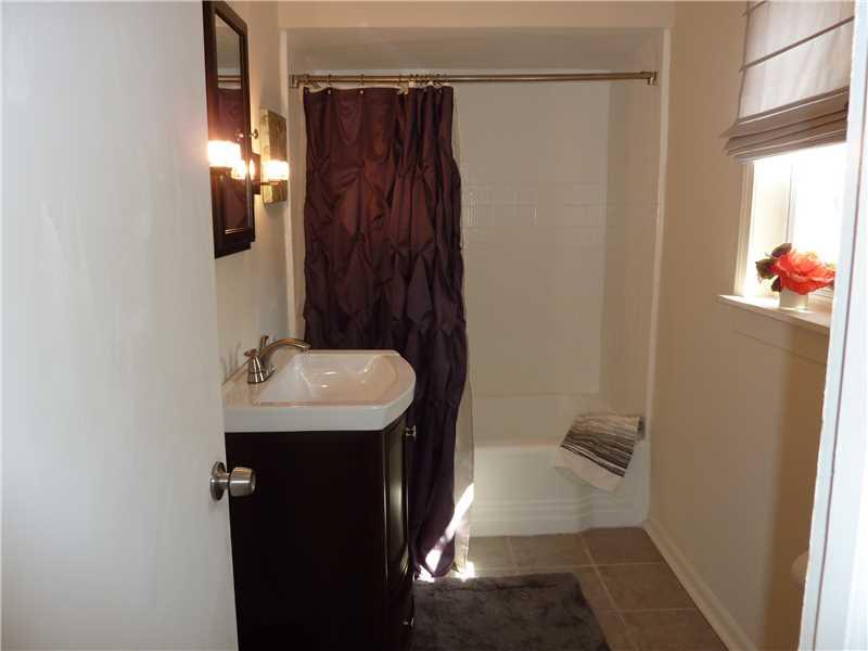 8352 Peebles Road Pittsburgh, PA 15237 - Photo 12 of 18 Full Bath. Updated nicely with ceramic tile, newer vanity and fixtures. Spacious tub and shower!