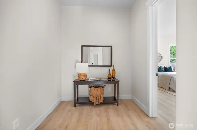 a room with furniture and wooden floor