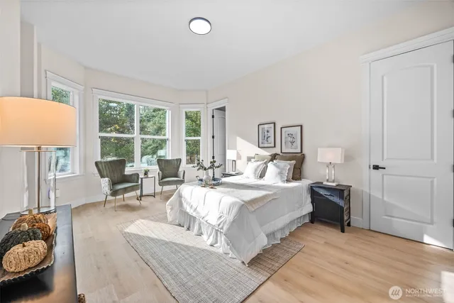 a bed room with a bed and a couch